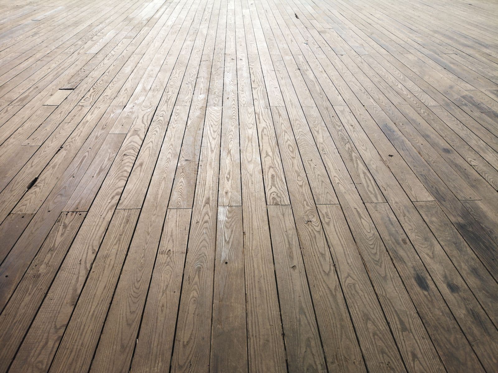 Wide view of aged wood deck boards